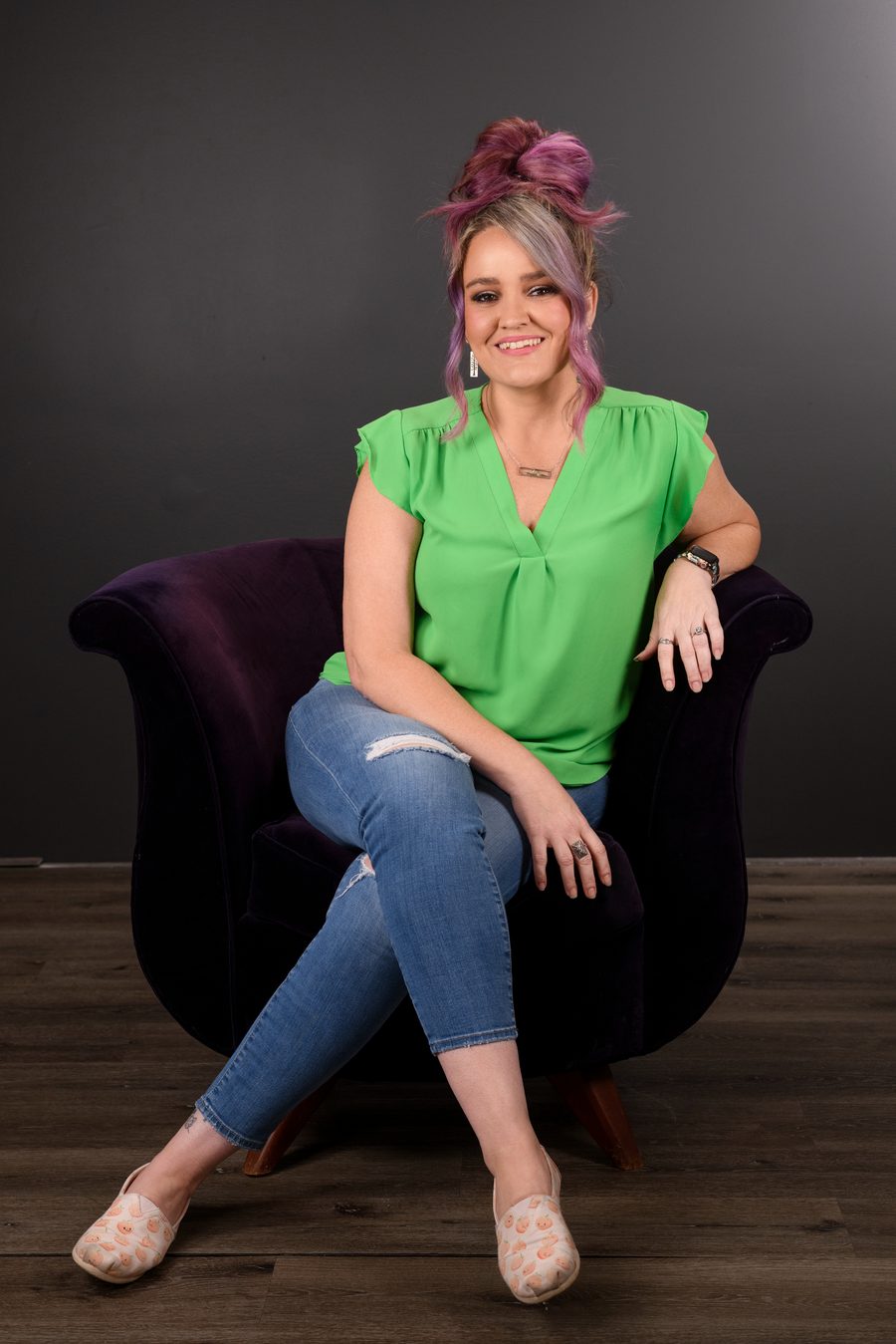 Jen Rodgers seated and smiling